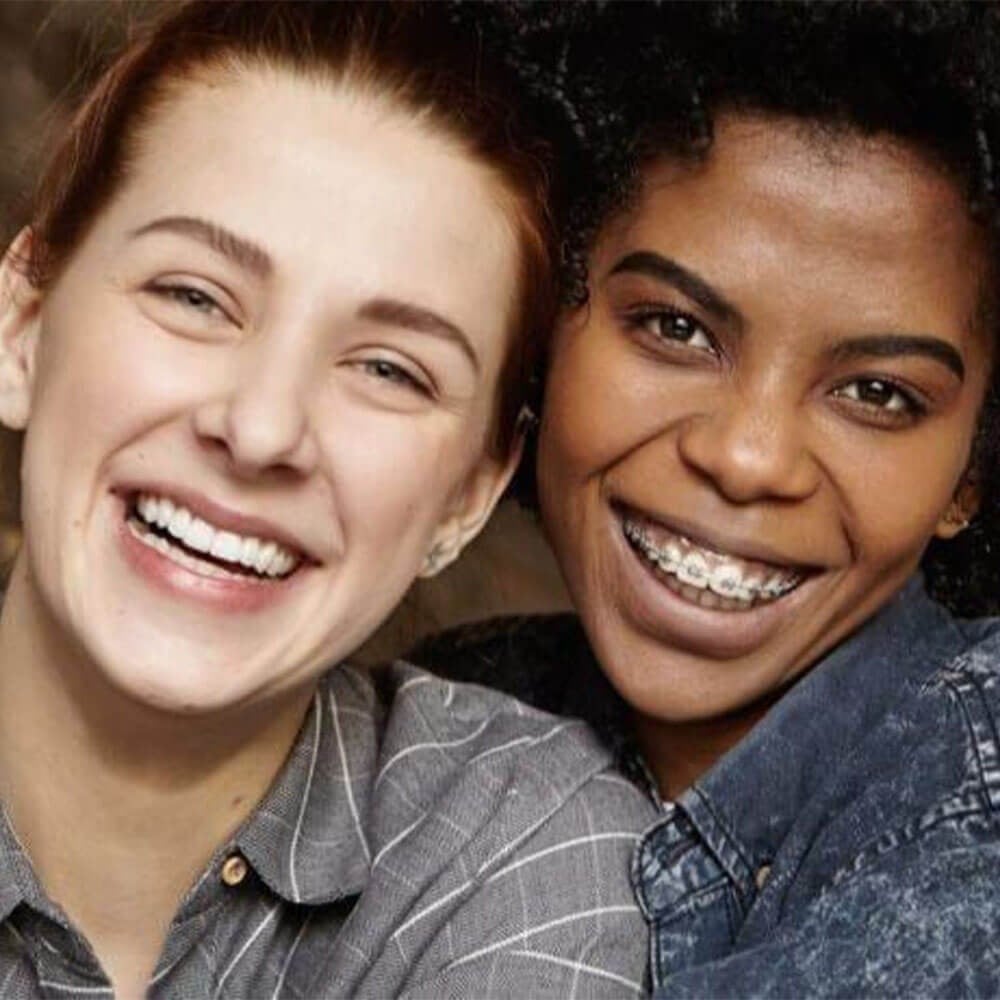 Two Smiling Adults